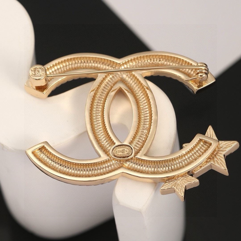 Ch**el brooches